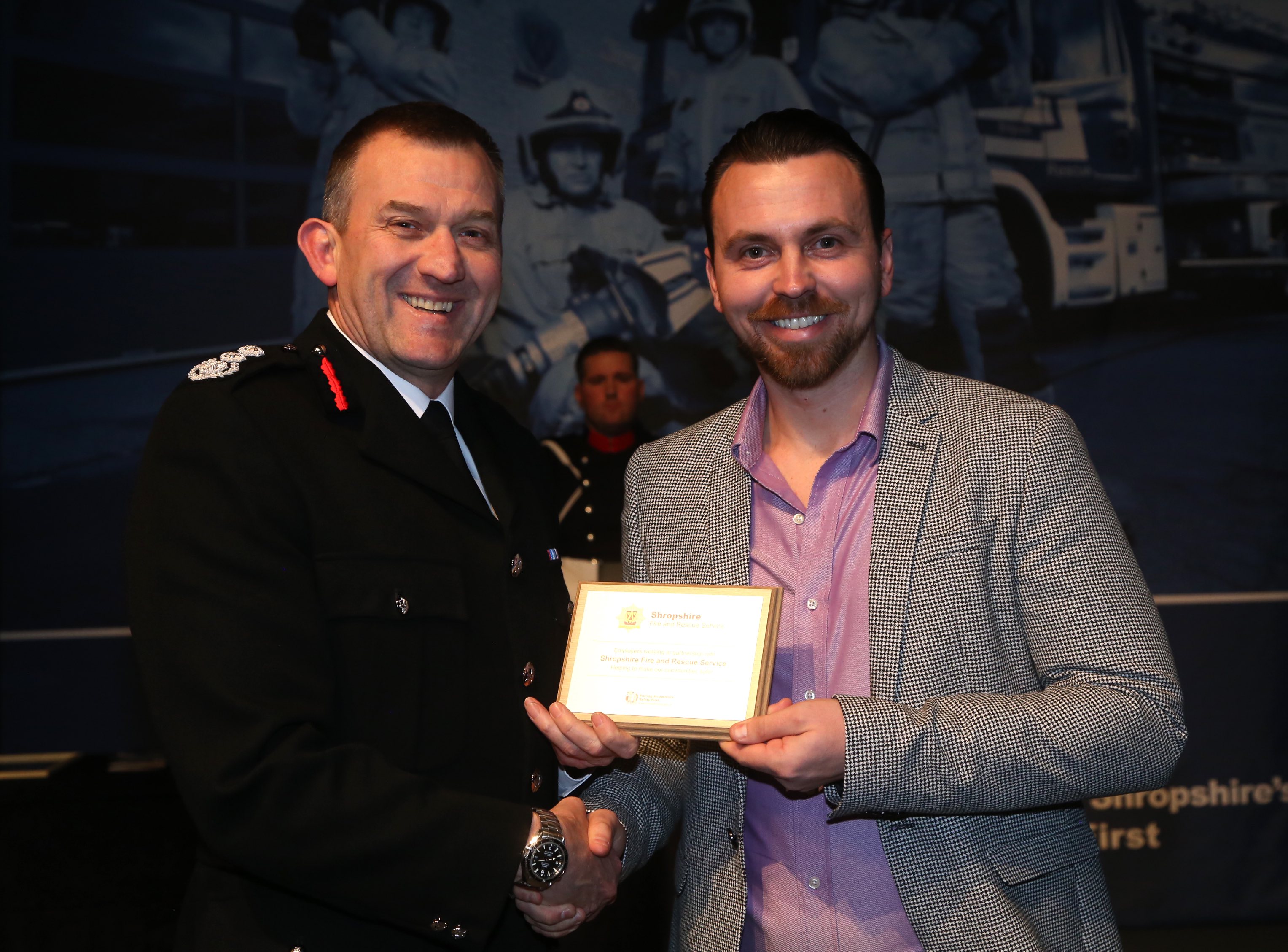 Tom Pain, from Cleobury Mortimer golf club, with the Chief Fire Officer