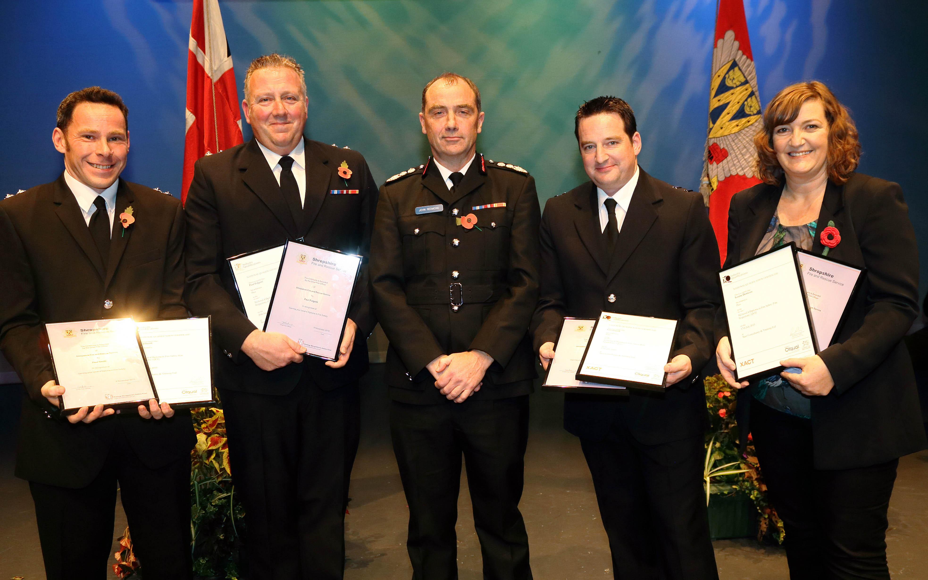 Paul Smith, Paul Fulgoni, Ceri Flavell, and Louise Derricutt, receive their awards.  Lynn Walker was unavailable to attend.