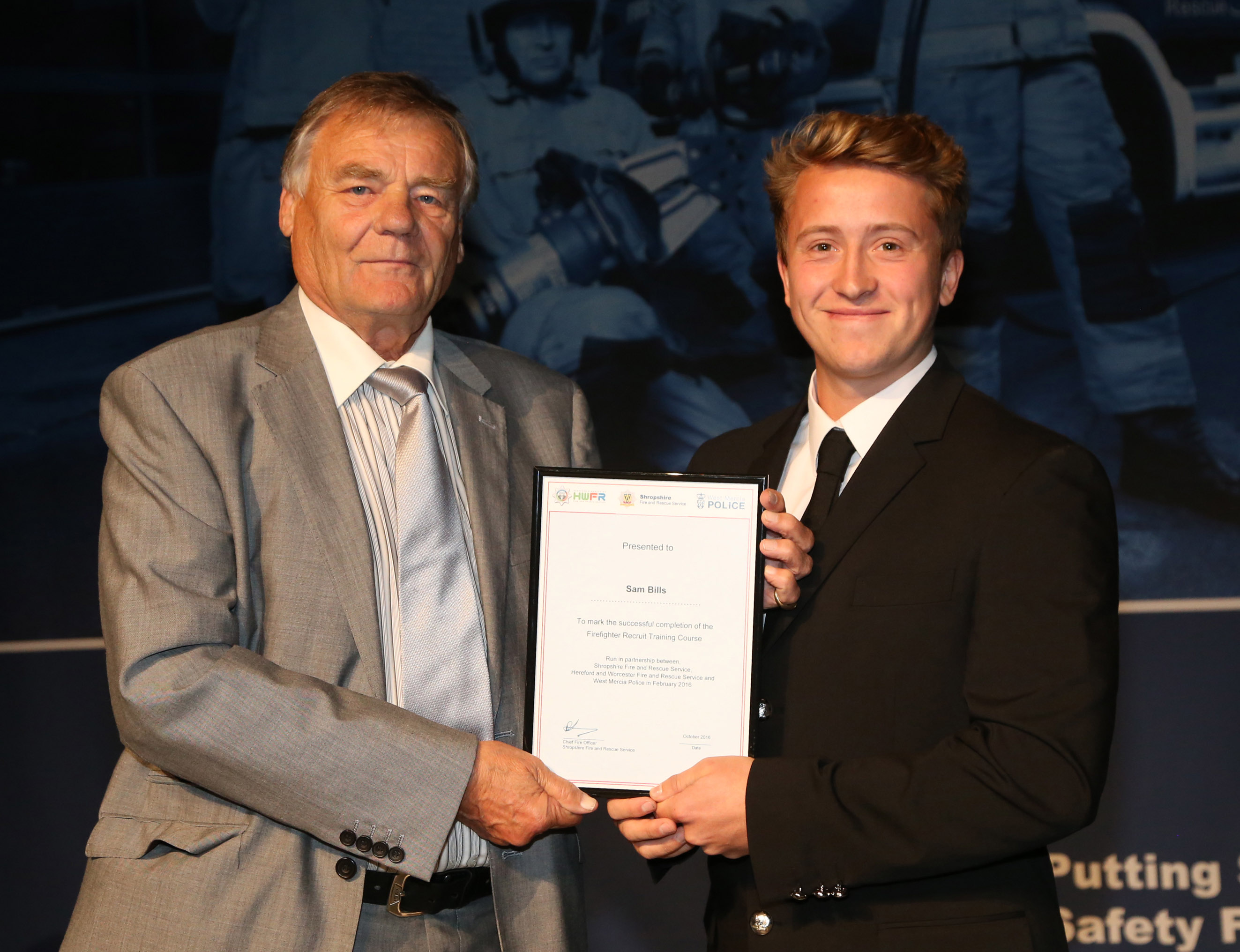 Delivery driver Sam Bills, from Cleobury Mortimer, won the top student award for his course as did Zoe Morgan, from Craven Arms, pictured with Watch Manager Matt Angell.