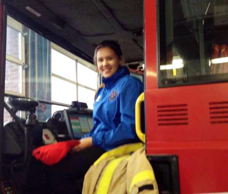 Angelina (16) sits happily aboard a Shropshire fire truck just days before she found out she is in remission from cancer caused by the nuclear fallout in Chernobyl more than 30 years ago.