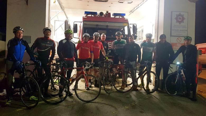 Tired but victorious after the marathon cycle ride at Devon’s Combe Martin Fire Station with local cyclists.