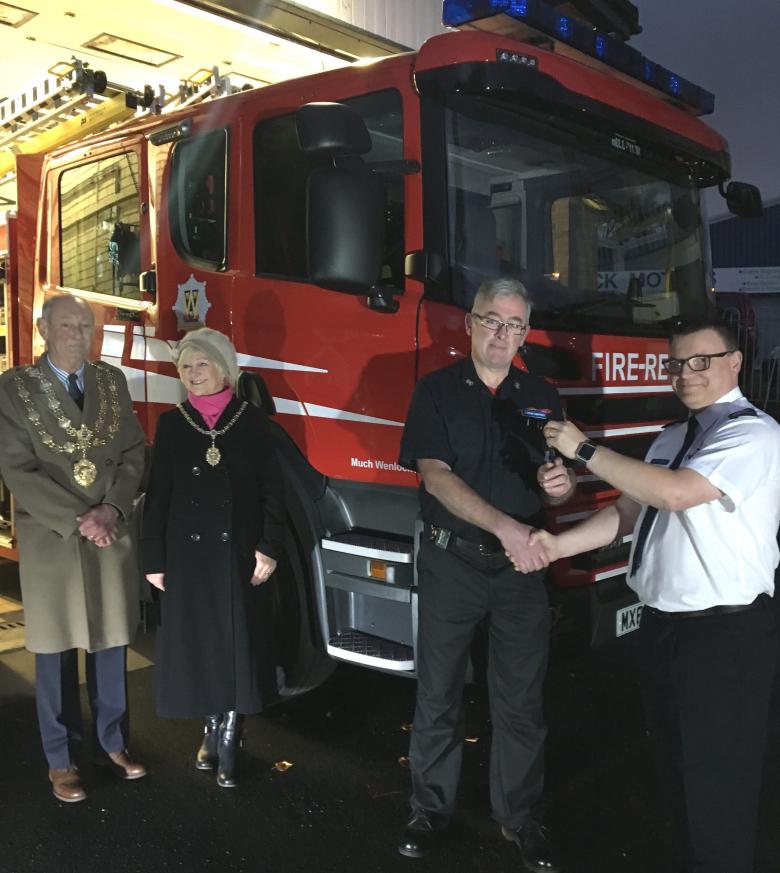 Deputy Chief Fire Officer Andy Johnson (right) hands over the keys to the new fire appliance for Much Wenlock to Watch Manager Alastair Humphries with the town’s mayor, Councillor Graham Edgcumbe Venning and his wife Christine, the mayoress.  