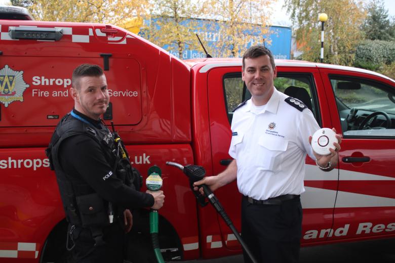 Station Manager James Bainbridge and PC Richard Bramwell in the joint fire and police safety campaign as part of Road Safety Week 2017 