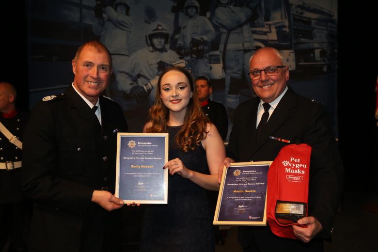 Watch Manager Martin Huckle and Technical Support Officer Emily Hodson receive an award from Shropshire’s Assistant Chief Fire Officer Dave Myers for raising funds for pet oxygen masks for firefighters. 